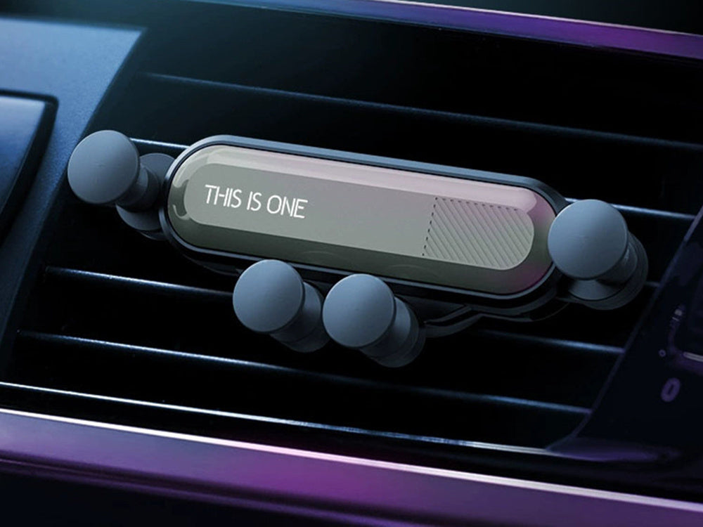 Gravitacinis automobilio grotelių laikiklis