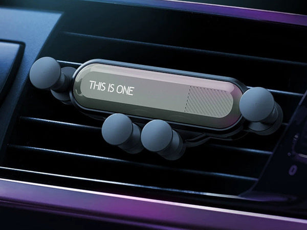 Gravitacinis automobilio grotelių laikiklis