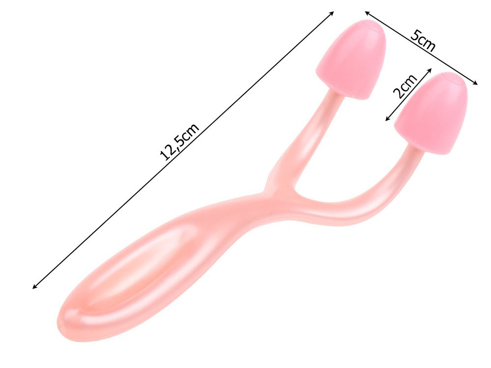 Nosį formuojantis prisegamas masažuoklis