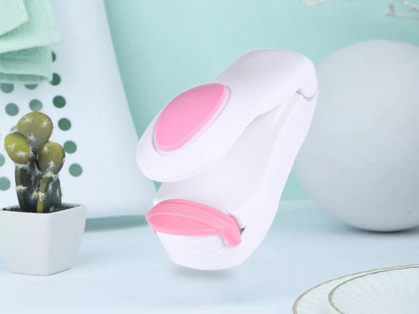 Belaidis rankinis folijos sandariklis mini