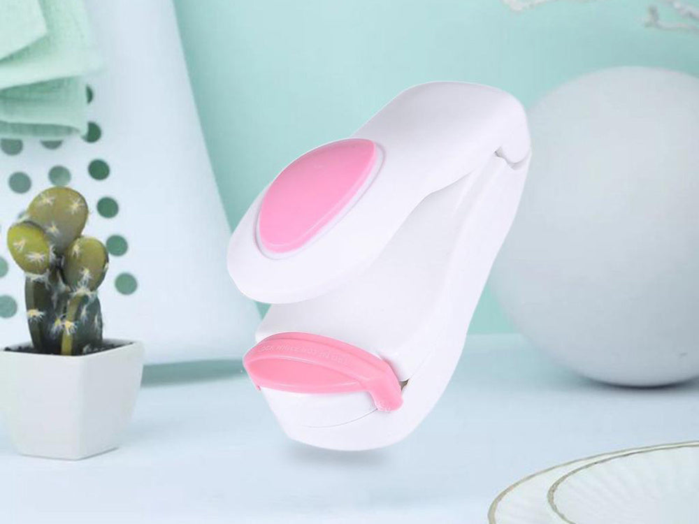 Belaidis rankinis folijos sandariklis mini