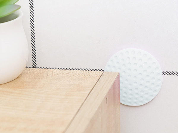 Durų rankenos buferis savaime prilimpa prie sienos