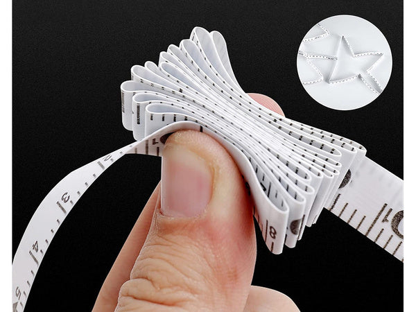 Xl matavimo juosta, susukta į 30 m ilgio matavimo juostą