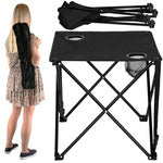 Nedidelis sulankstomas žvejybos stalas balkone, skirtas stovyklavimui po palapine