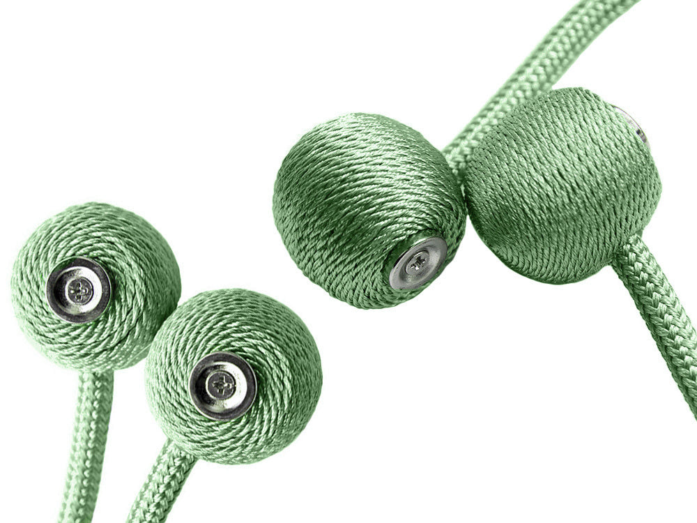 Dekoratyviniai užuolaidų spaustukai, turintys stiprų magnetą