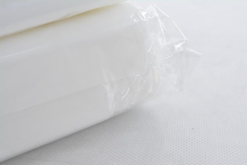 Vienkartinis galvos atlošo dangtelis 100 vienetų pakuotė